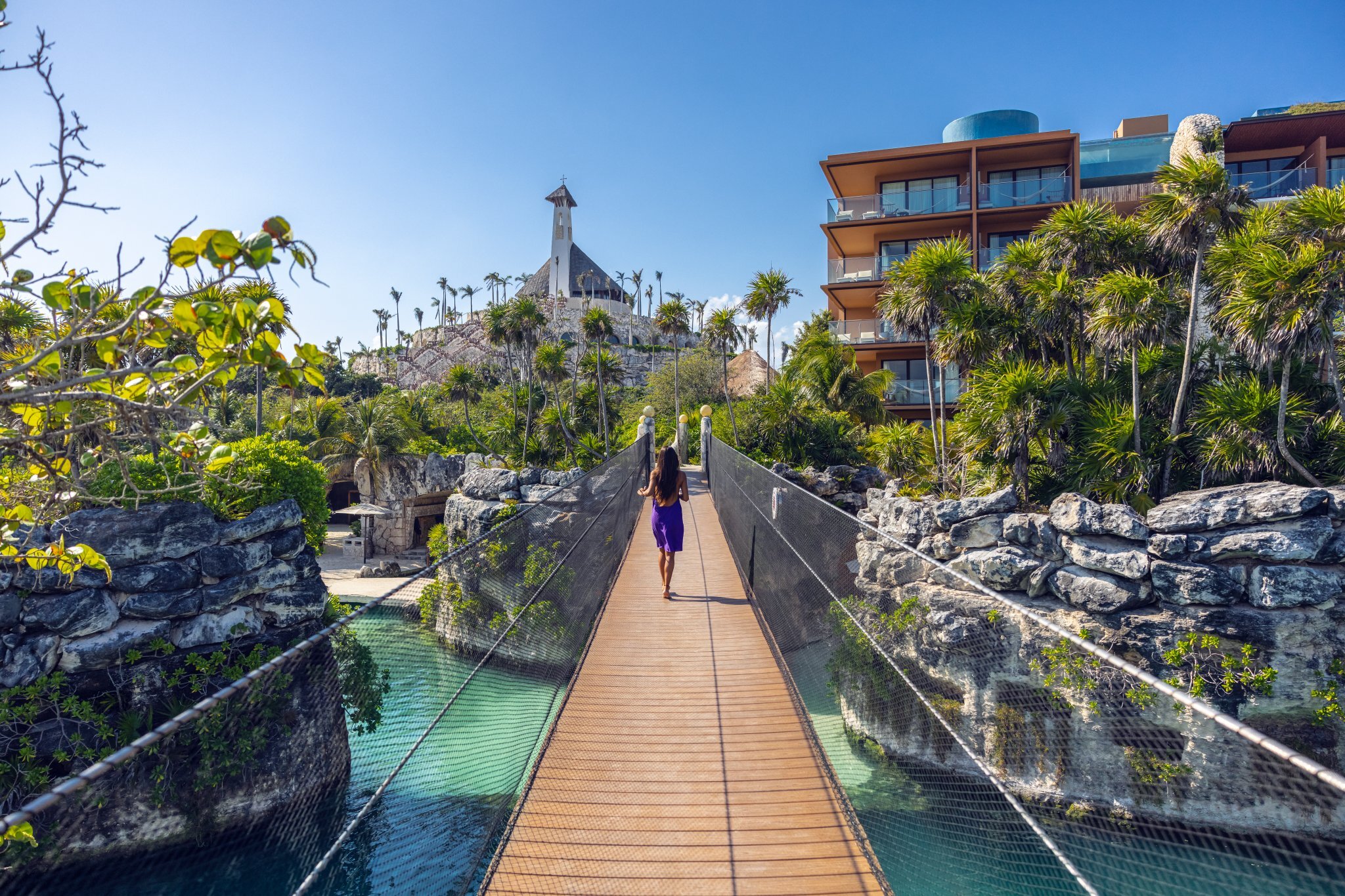 Walkway within the Xcaret resort landscape